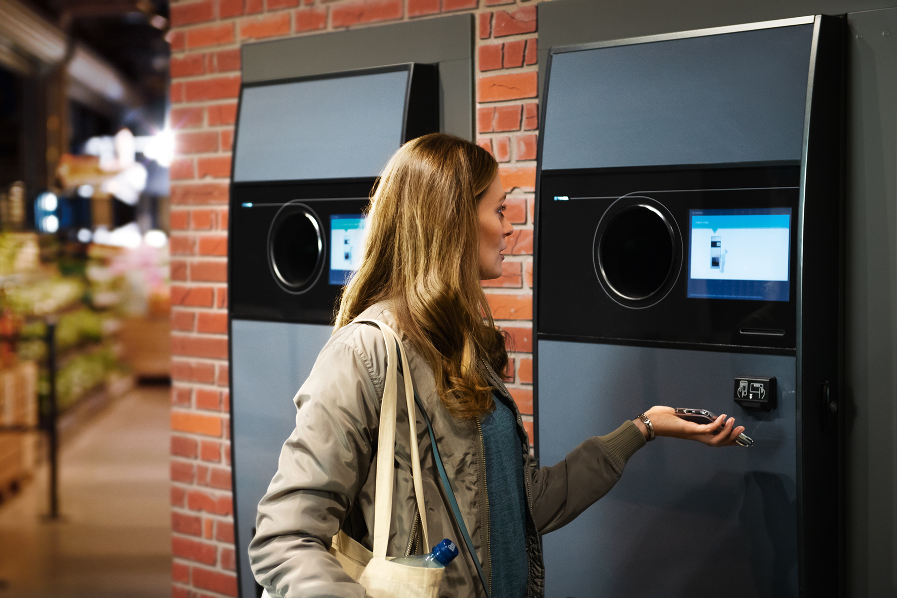 Woman in front of T9 machine